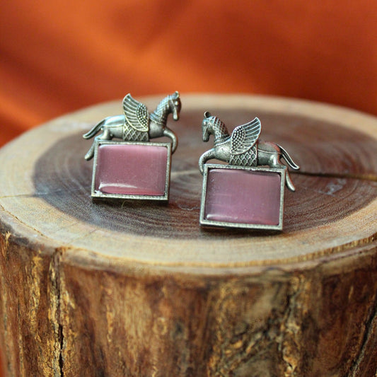 Silva Sutra pink unicorn studs