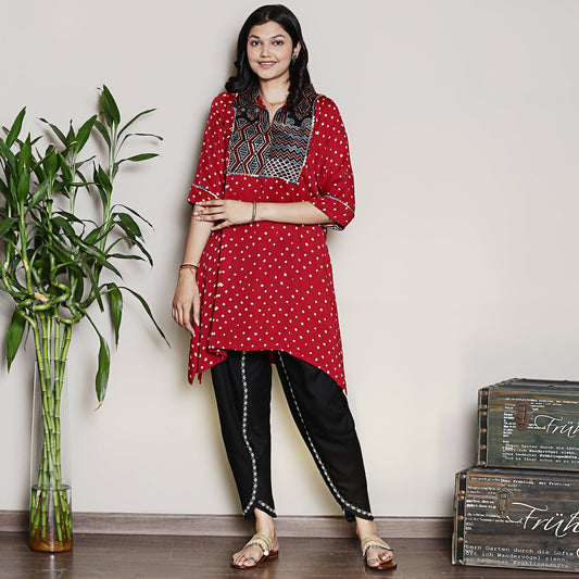 Bandhani asymmetric kurta with yoke detailing.