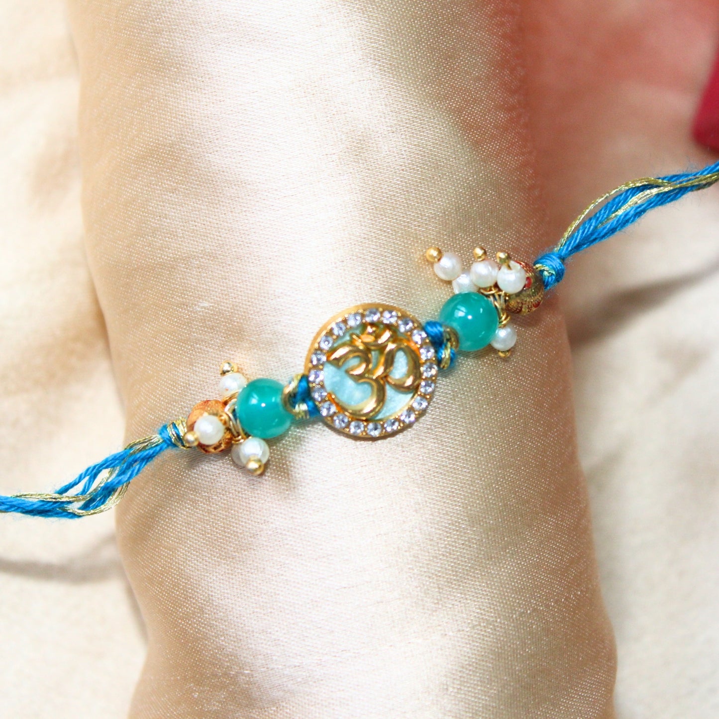 Divine om serenity rakhi