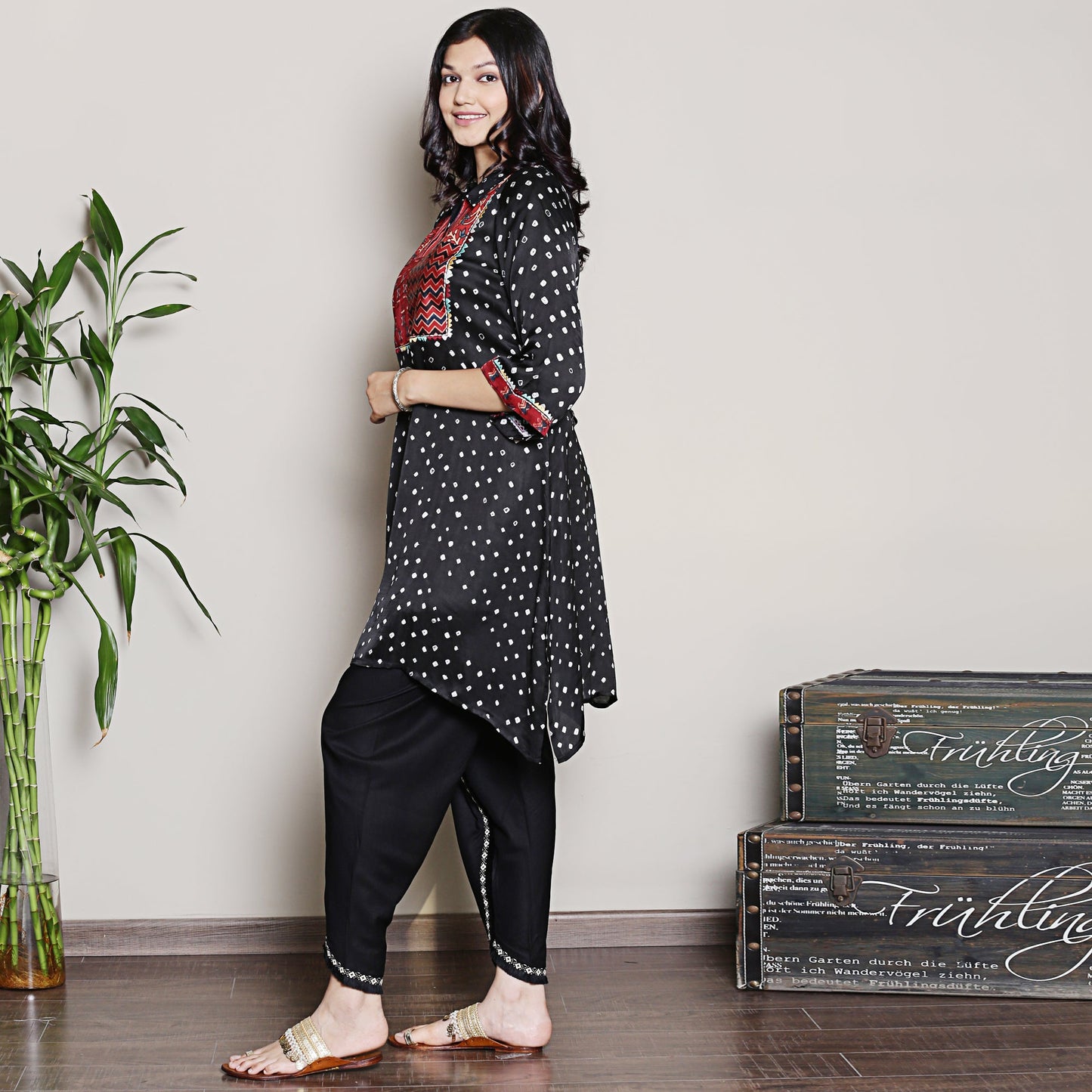 Bandhani asymmetric kurta with yoke detailing.