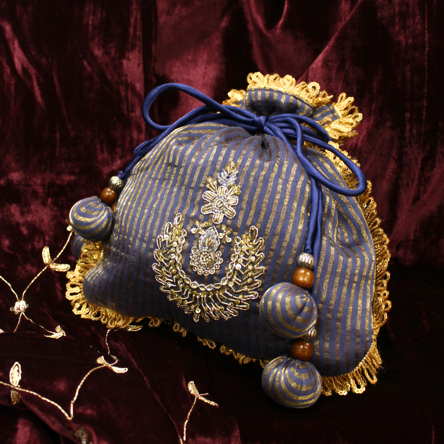 Blue Tissue Chanderi hand embroidered Potli bag