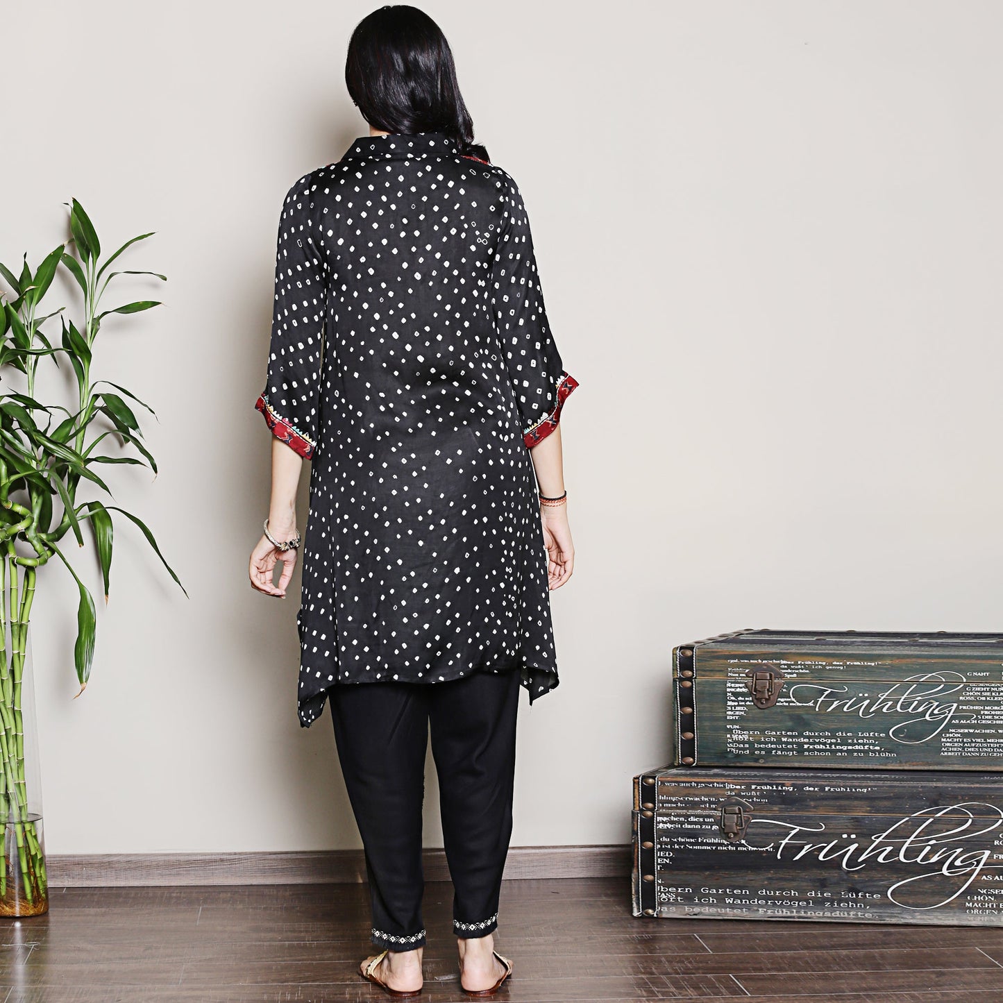 Bandhani asymmetric kurta with yoke detailing.