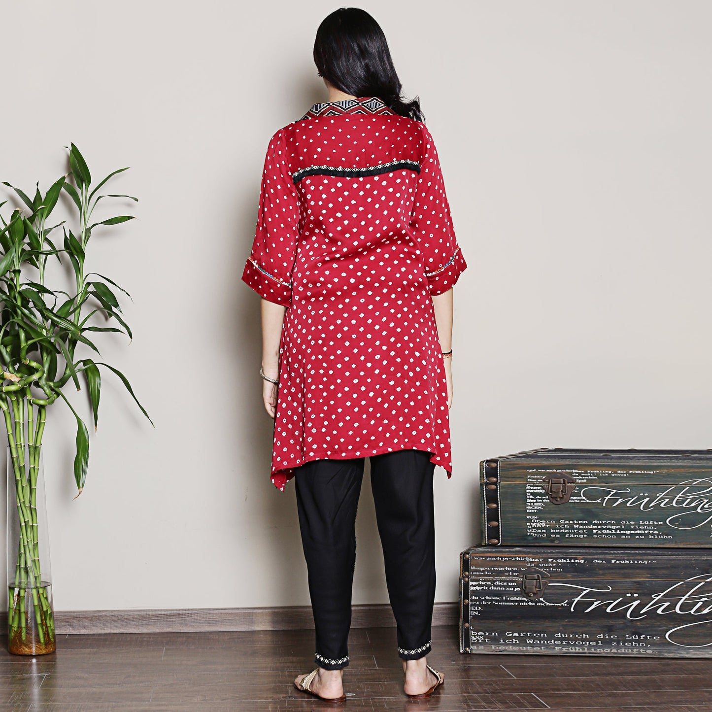 Bandhani asymmetric kurta with yoke detailing.