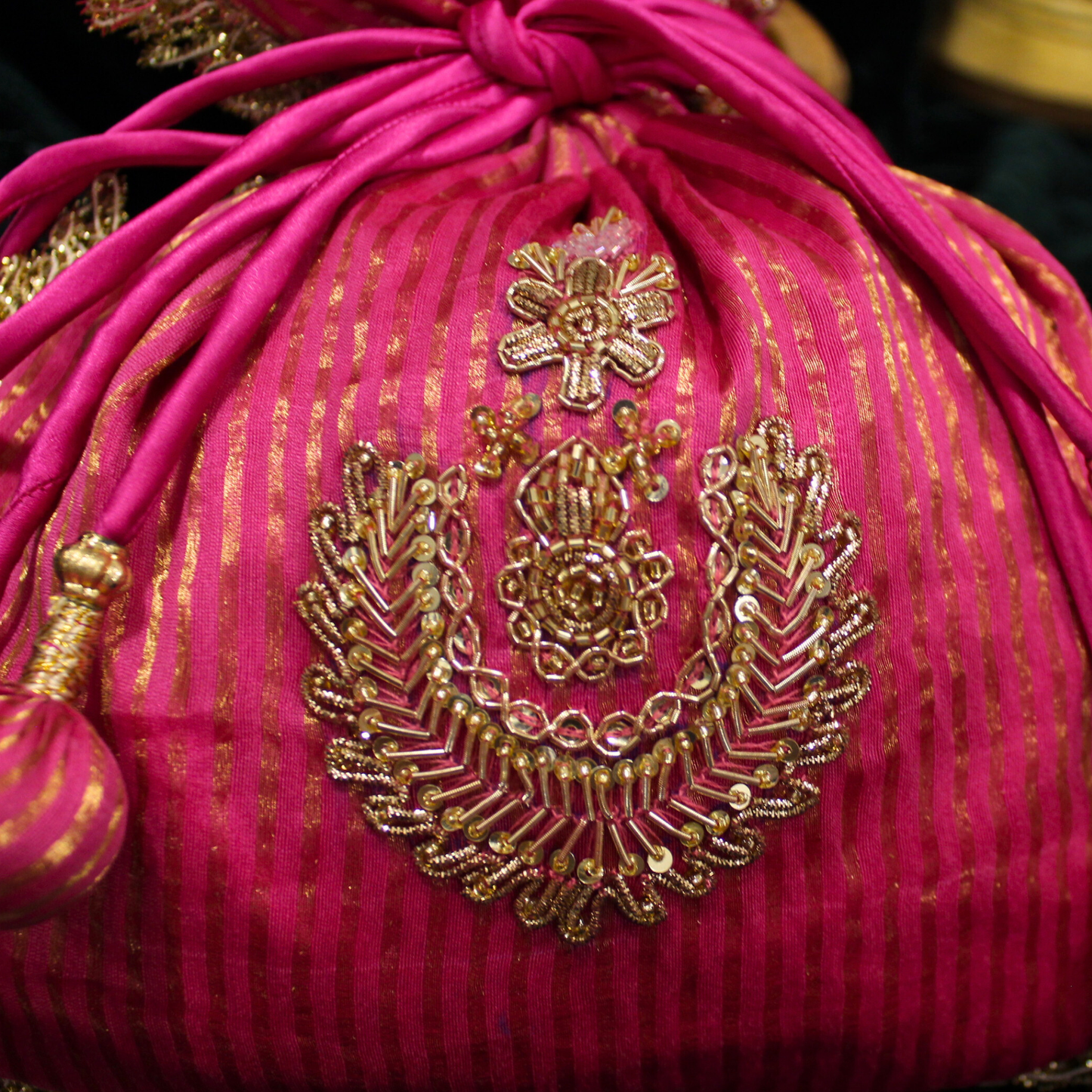 Pink Tissue Chanderi hand embroidered Potli bag