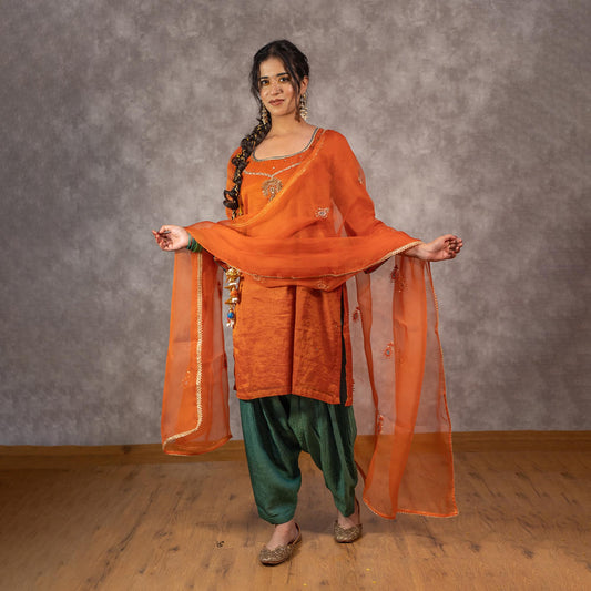 Orange Tissue Chanderi kurta set with Contrast Salwar and matching Dupatta