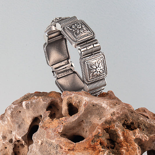 Silver oxidised bangles with floral detailing