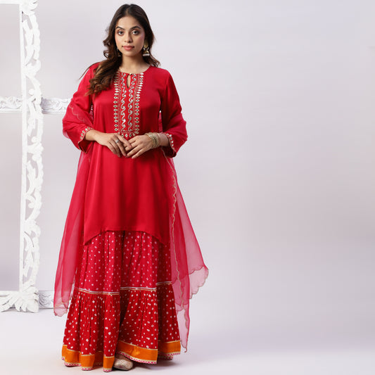 multicolored bandhni sharara set in modal silk with organza dupatta