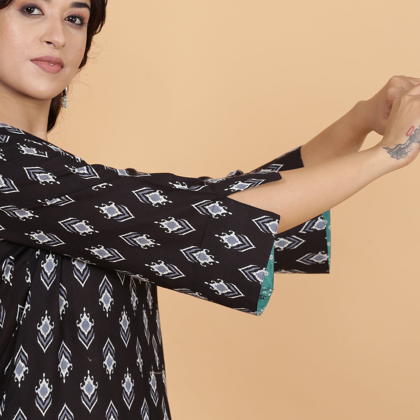 Black ikat co-ord set with striped pants
