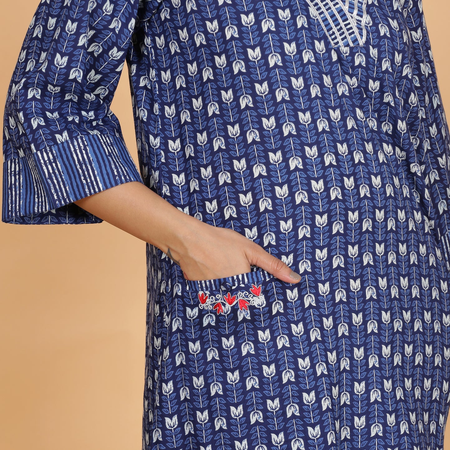 Blue pocket kurta set with Embroidery and striped pants