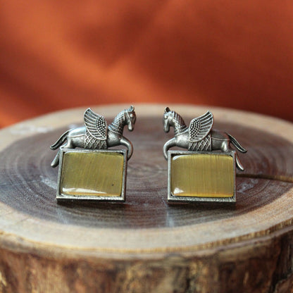 Silva Sutra yellow unicorn studs