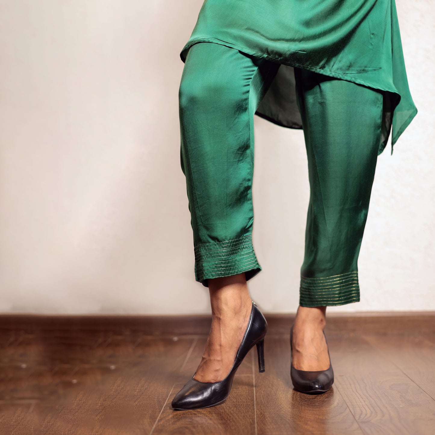 Green asymmetric modal silk kurta set with ajrakh yolk detailing