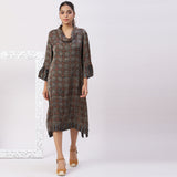 Asymetric cowl neck dress in ajrakh modal silk fabric with flared sleeves.