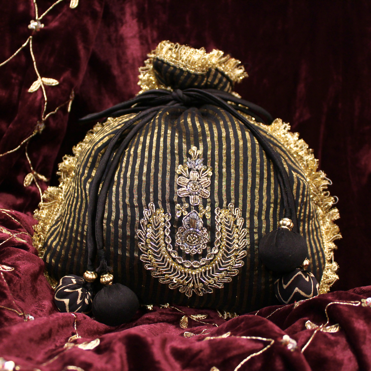 Black Tissue Chanderi hand embroidered Potli bag