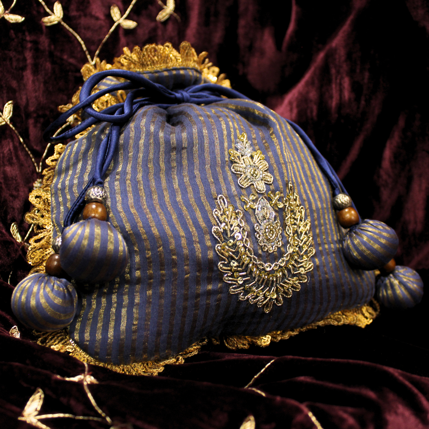 Blue Tissue Chanderi hand embroidered Potli bag