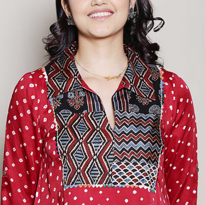 Bandhani asymmetric kurta with yoke detailing.