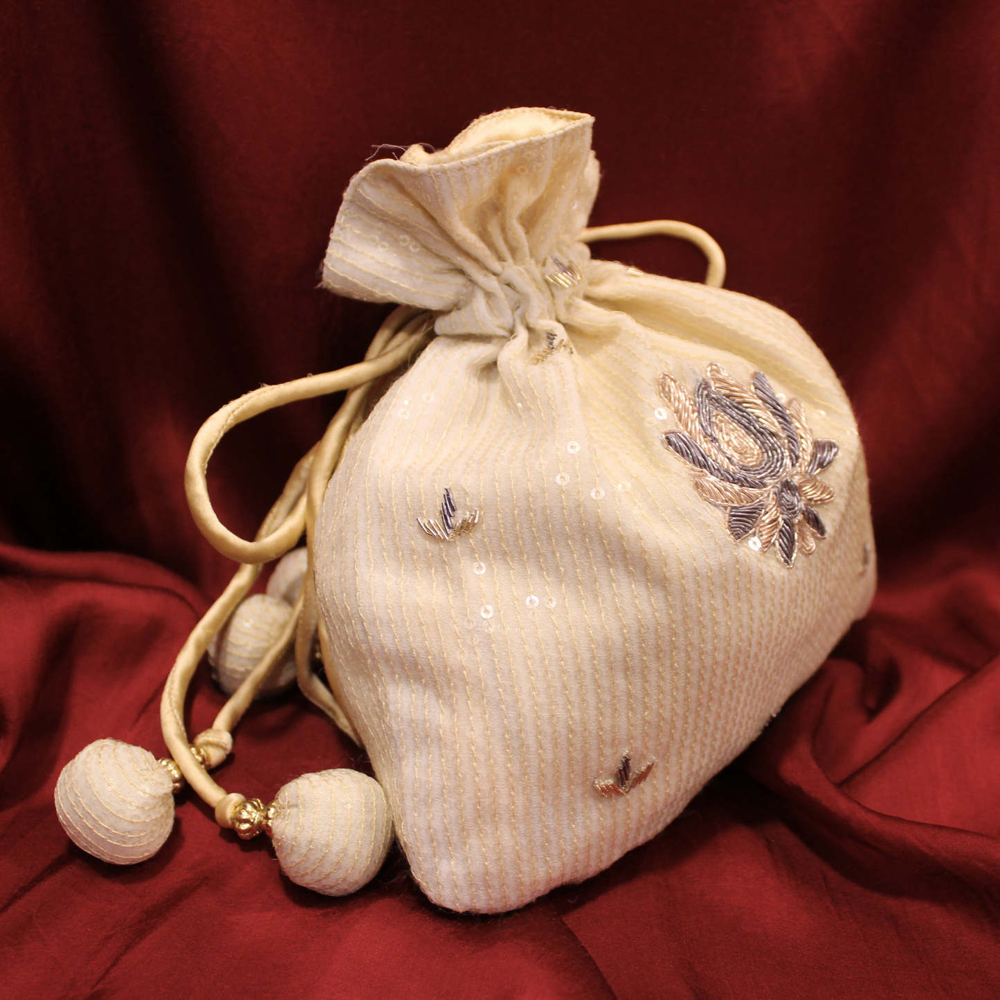 Cream Sequined Georgette hand embroidered Potli bag