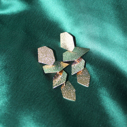 Golden mosaic drops
