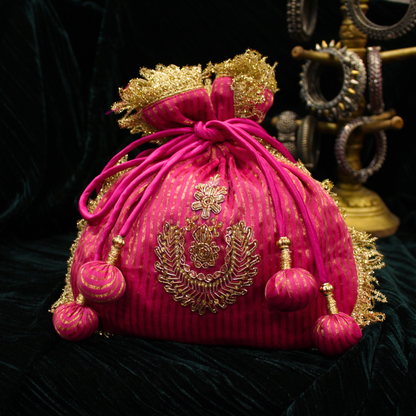 Pink Tissue Chanderi hand embroidered Potli bag