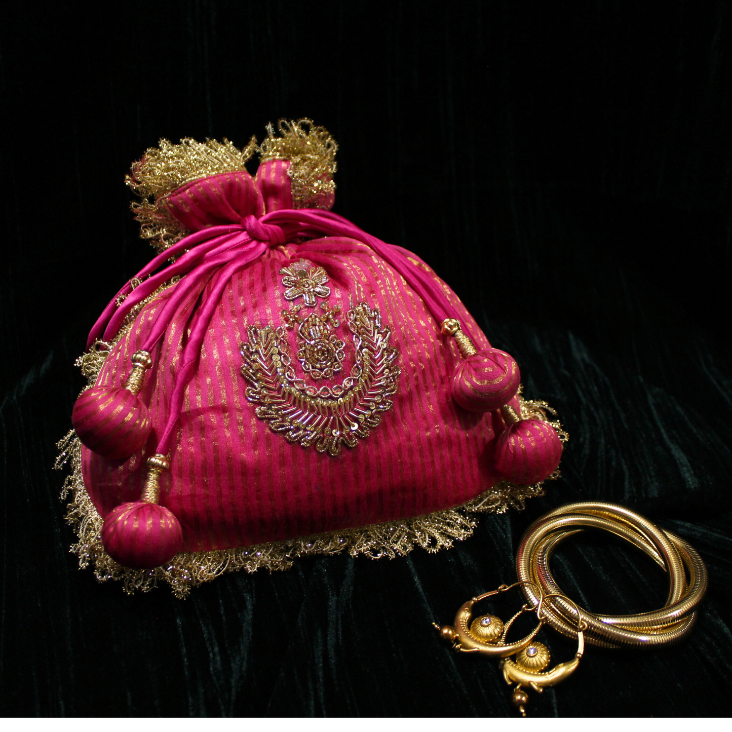 Pink Tissue Chanderi hand embroidered Potli bag