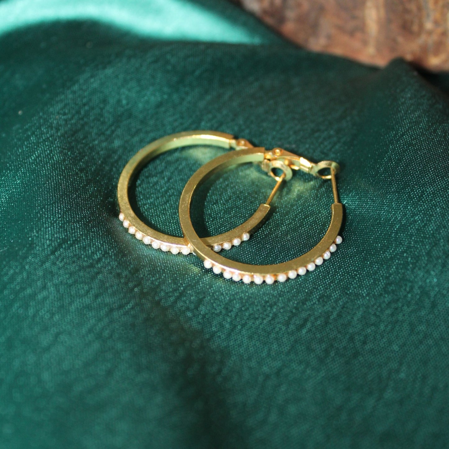 Stone studded gold hoops
