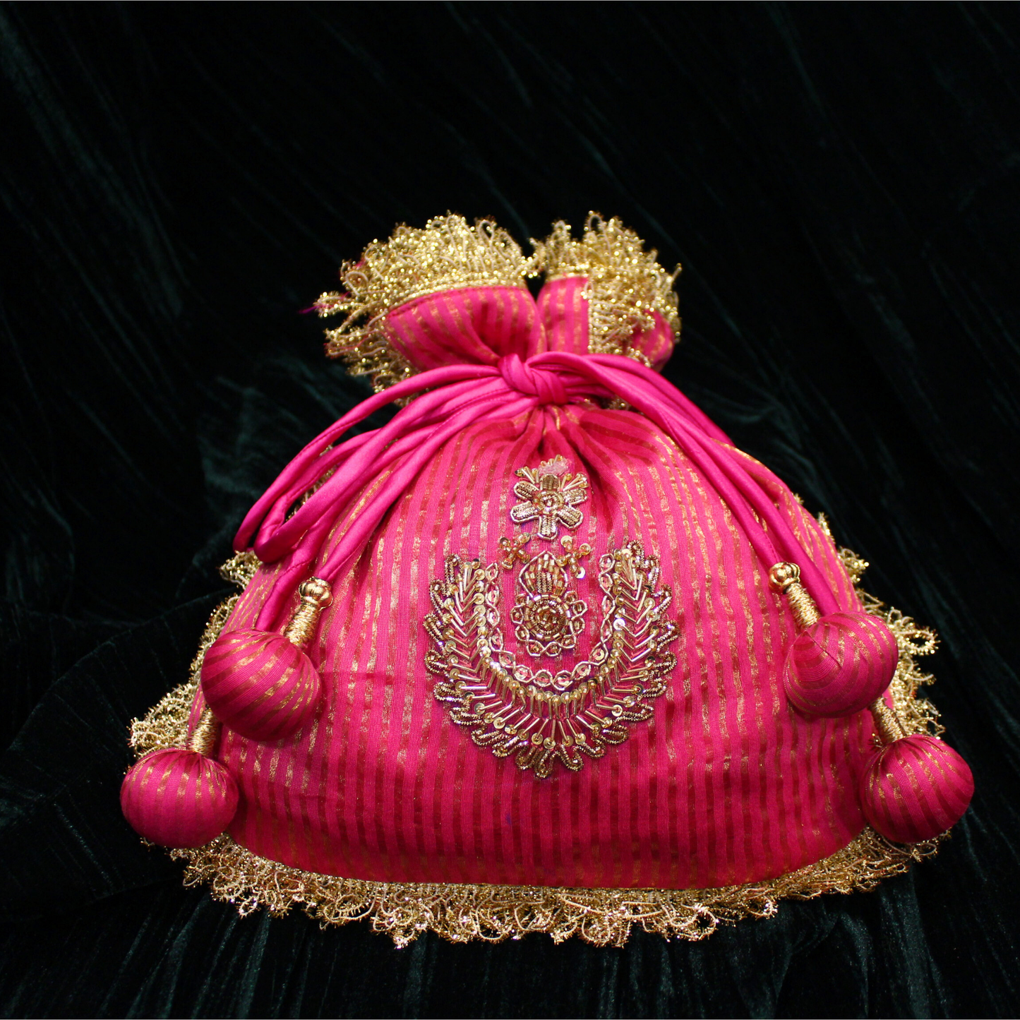 Pink Tissue Chanderi hand embroidered Potli bag