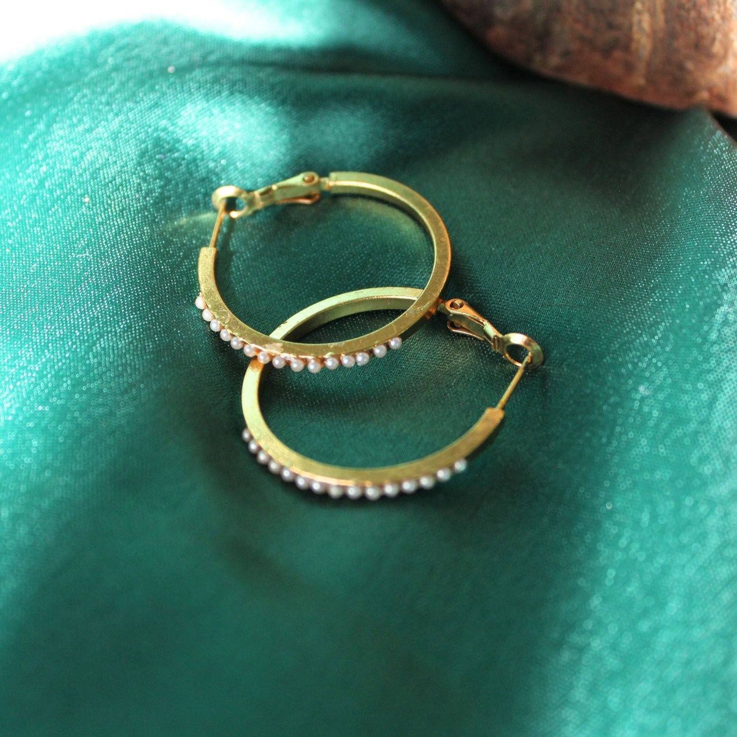 Stone studded gold hoops