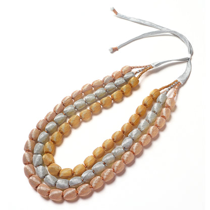 3 layer fabric beaded necklace in metallic tones