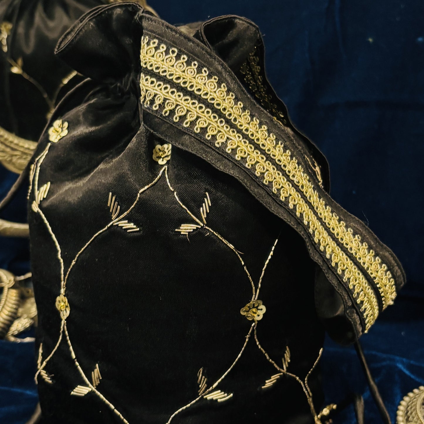 Black mashru embroidered potli