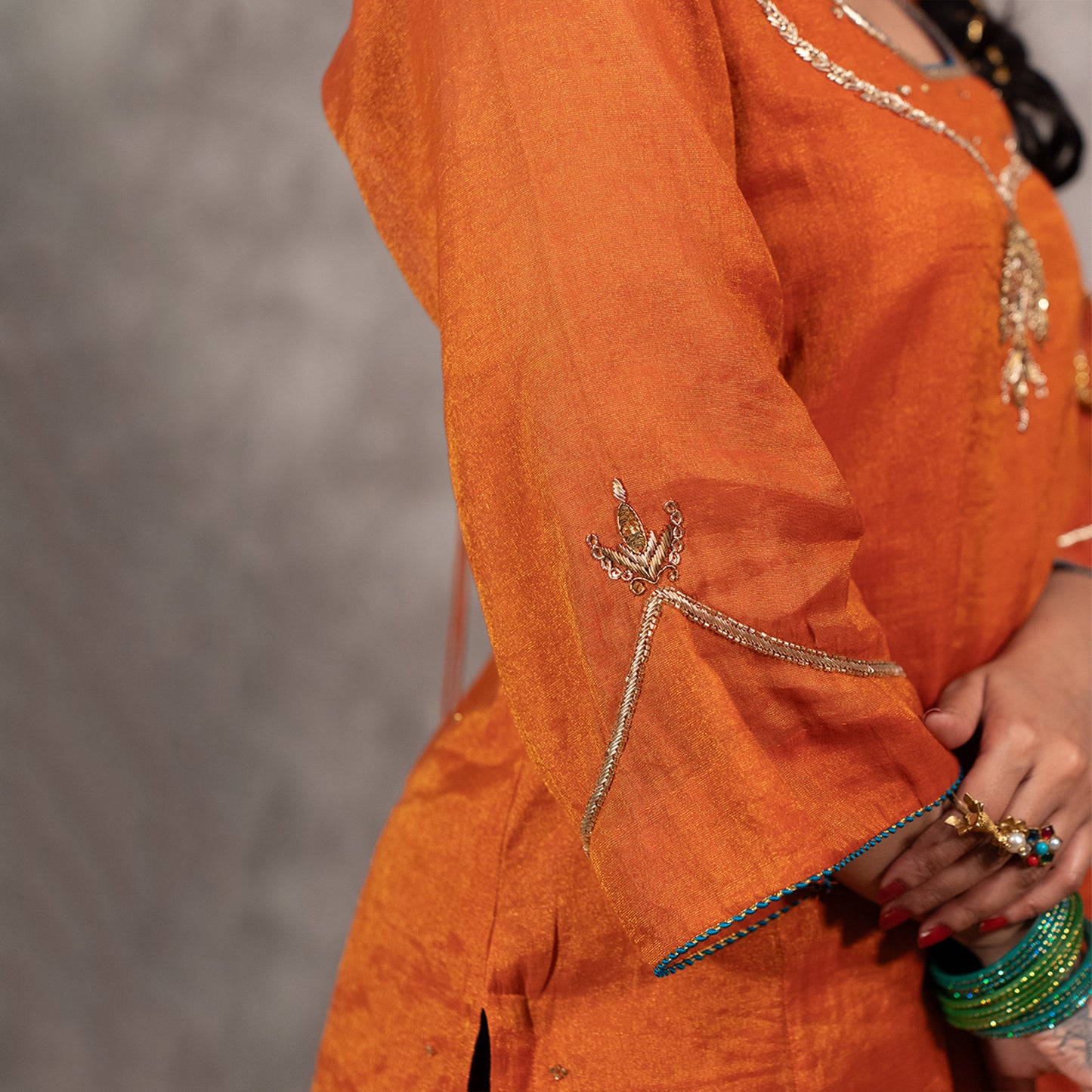 Orange Tissue Chanderi kurta set with Contrast Salwar and matching Dupatta
