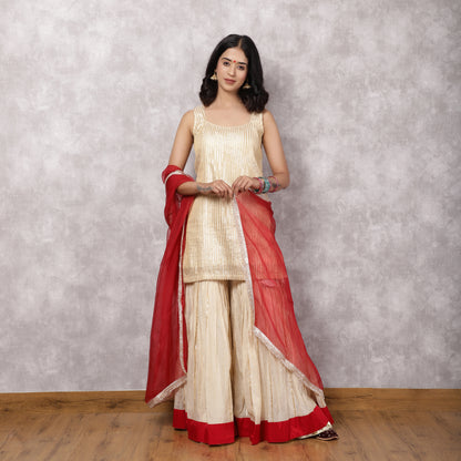 Off white Tissue Chanderi gota work Sharara Set with red dupatta