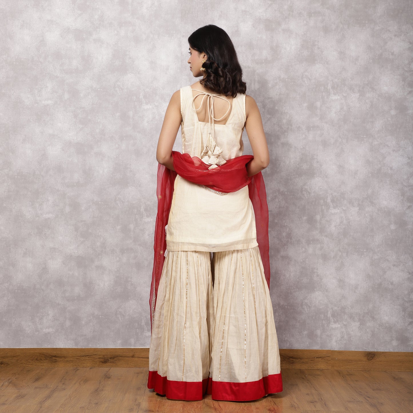 Off white Tissue Chanderi gota work Sharara Set with red dupatta