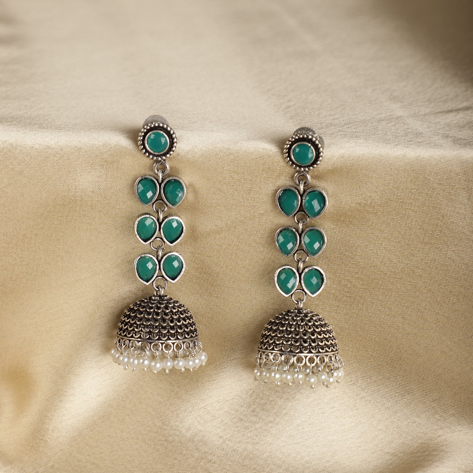 Emerald Green Drop Jhumkas - Antique Finish Close-up - Spring Soul