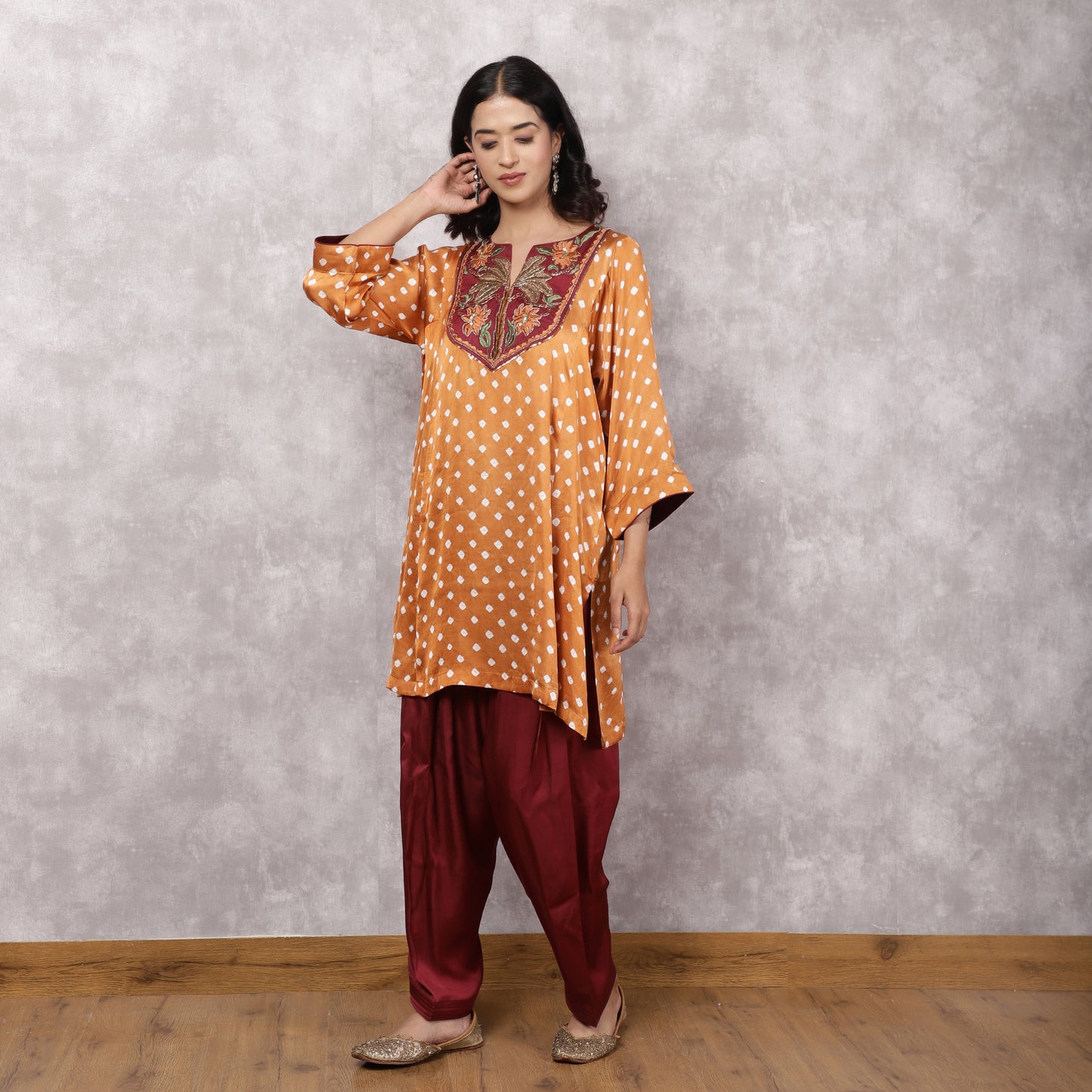 Orange Bandhani Suit Set with Hand Embroidered Yoke and Potli Bag
