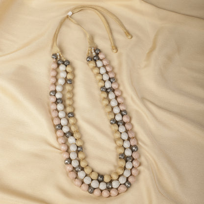 Metallic cotton tissue necklace close-up - Spring Soul