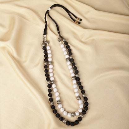 Black and white satin necklace close-up - Spring Soul
