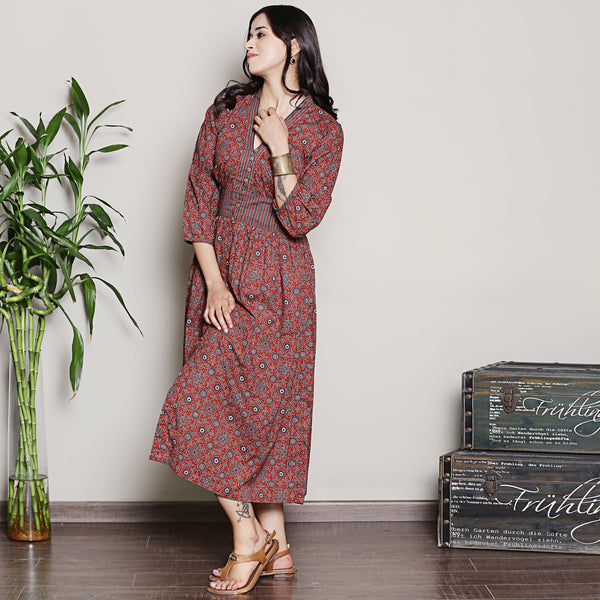 Maroon printed cotton gathered dress with functional buttons