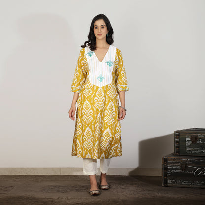 Yellow Ikat Kurta set with Embroidered Yoke and Off-white Pants