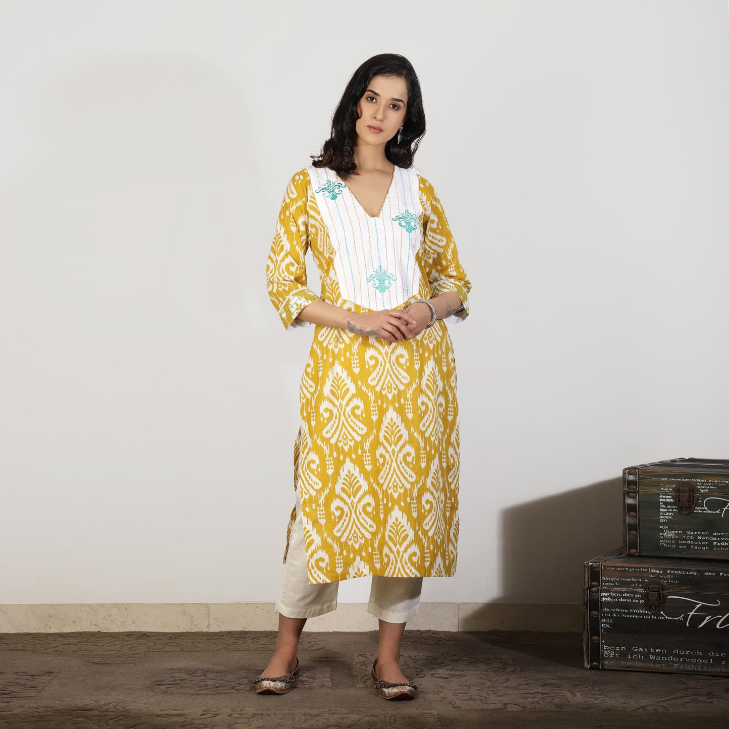 Yellow Ikat Kurta set with Embroidered Yoke and Off-white Pants