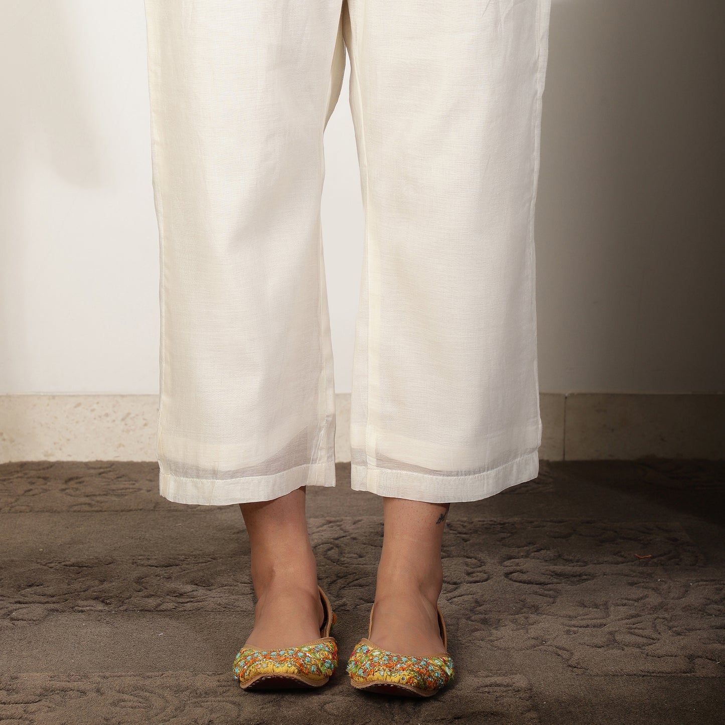 Off-white A-line kali Kurta set with Threadwork Embroidery
