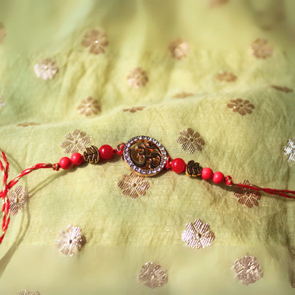 OM beaded rakhi
