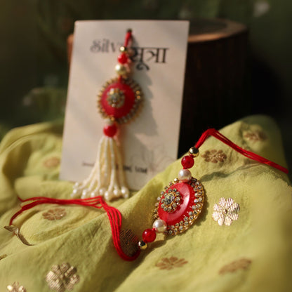Red studded rakhi set of 2