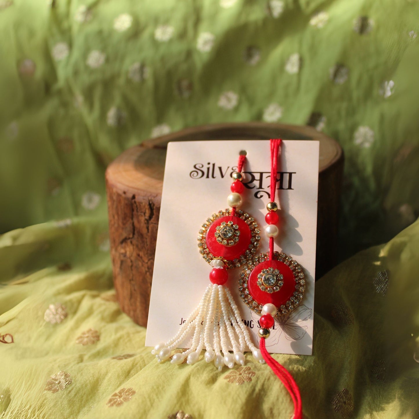 Red studded rakhi set of 2