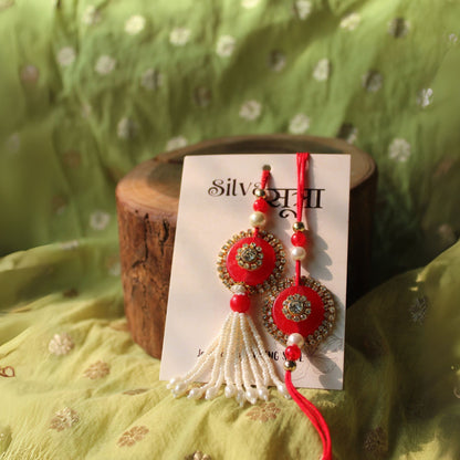 Red studded rakhi set of 2