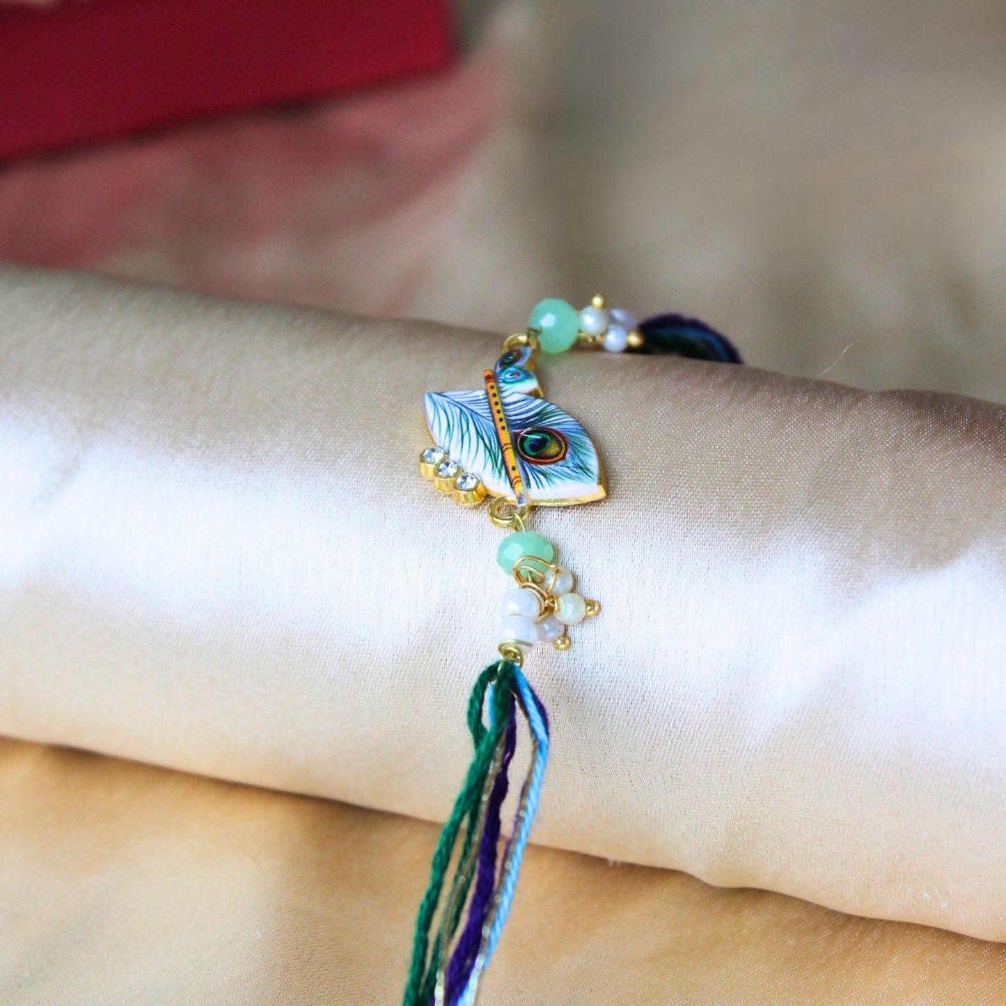 Morpankh charm rakhi