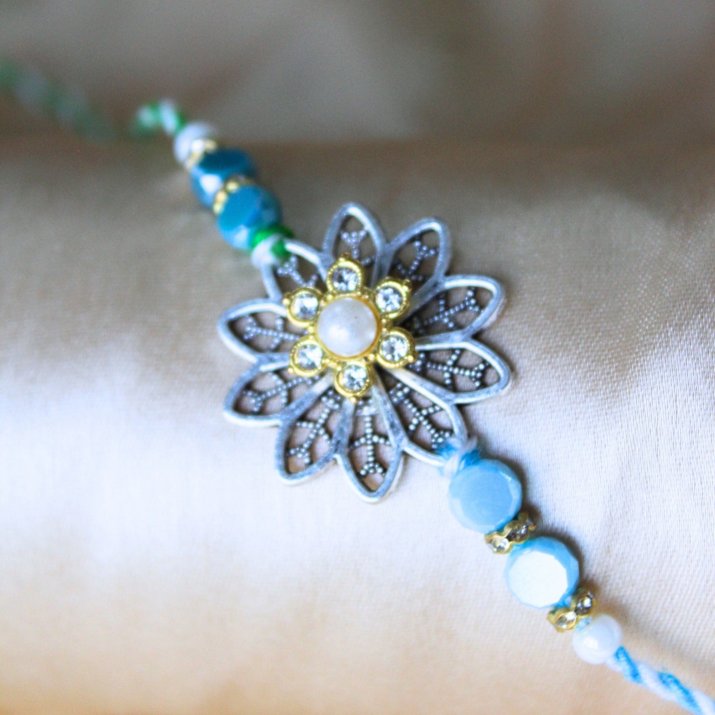 Green floral rakhi