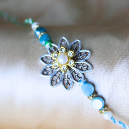 Green floral rakhi