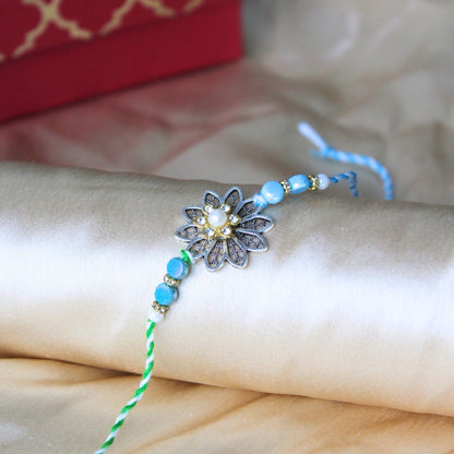 Green floral rakhi