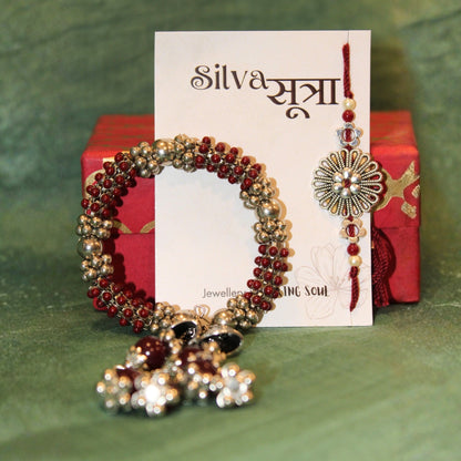 Maroon jhumkar rakhi set of 2