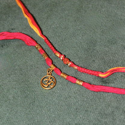 red om rakhi set of 2