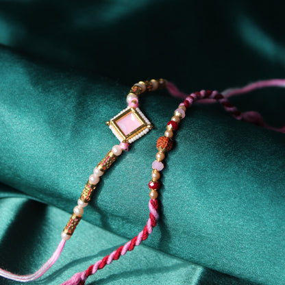 pink grace rakhi set of 2
